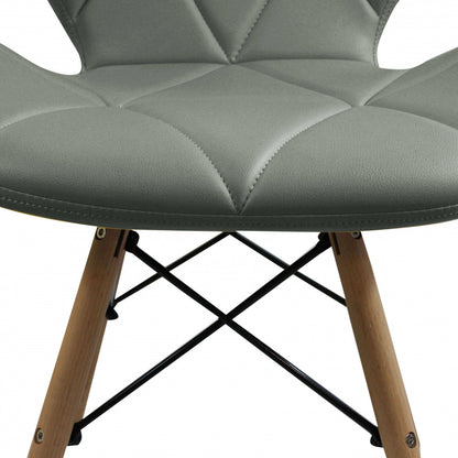 Sedia moderna grigia in ecopelle con gambe in legno Salone Salotto Camera